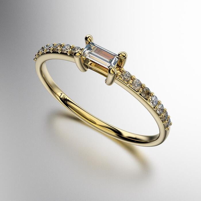 ANILLO PIEDRA CENTRAL BAGUETTE APAISADA CON PIEDRAS REDONDAS A LOS COSTADOS (MOD. A041) ANILLO PIEDRA CENTRAL BAGUETTE APAISADA CON PIEDRAS REDONDAS A LOS COSTADOS (MOD. A041)